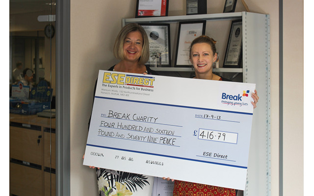 Break's Molly Housego receives the cheque for £416.79