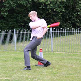 Charlie getting sporty enjoying a game of lunchtime rounders