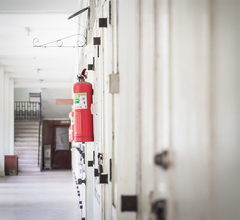 fire extinguishers mounted on the wall