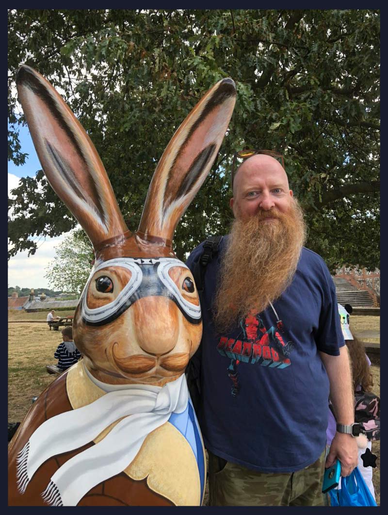 Hareman enjoys a selfie with a gentleman with a splendid beard