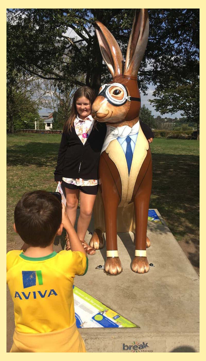 Young man takes photo of his cousin with Hareman