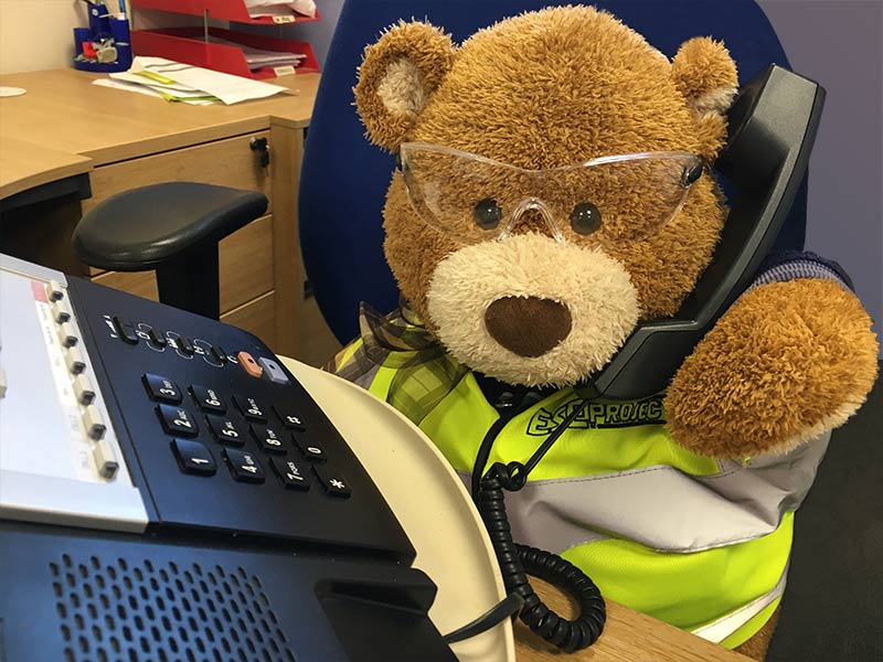 Health and Safety Bear says, Don't listen to answer phone messages on speaker