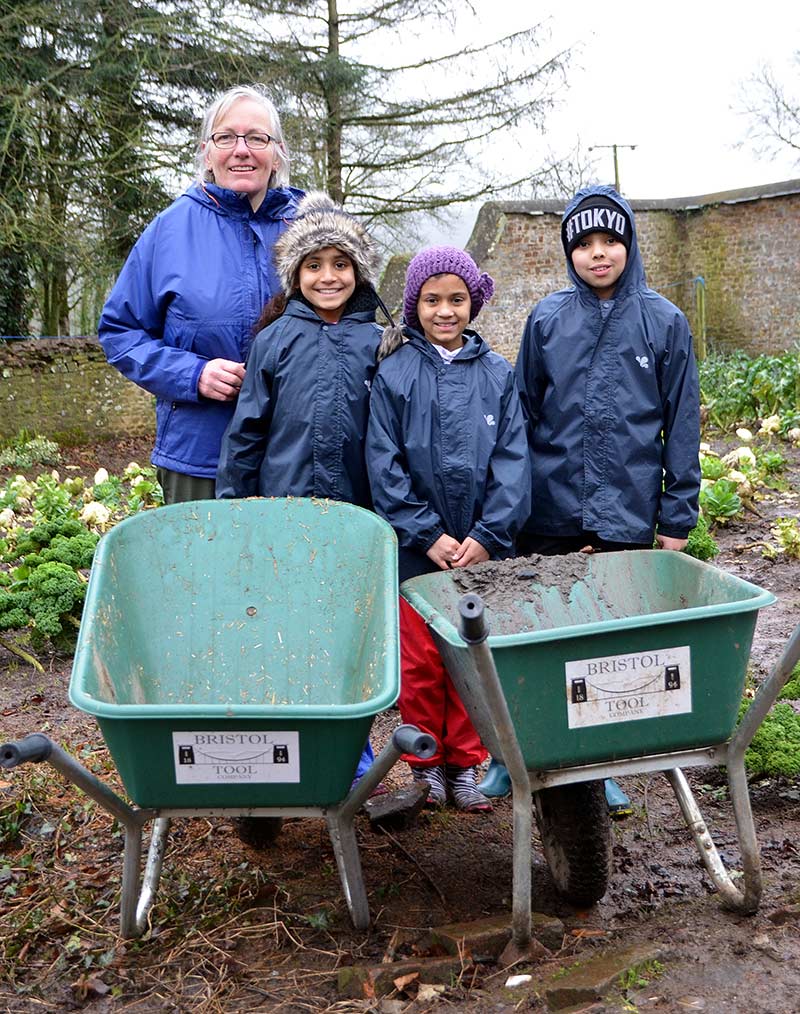 Children enjoying using the wheelbarrows donated by ESE Direct to Farms for City Children