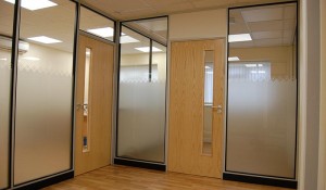 Glass partitioning maximising light throughout Choice Homes' offices