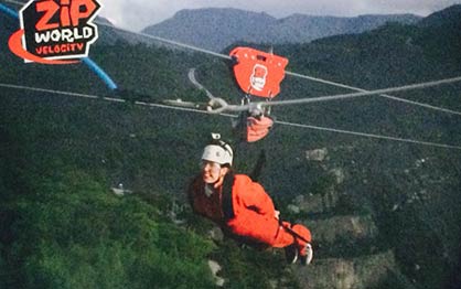 Laura Holland rides the world's longest zip wire in aid of The Norfolk and Norwich Association for the Blind - Charity Winners April 2015