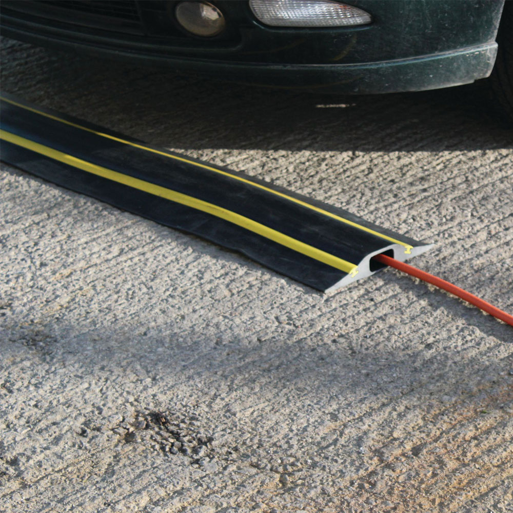 Click to view product details and reviews for Traffic Calming Cable Protector 15m Long Wide Hole.